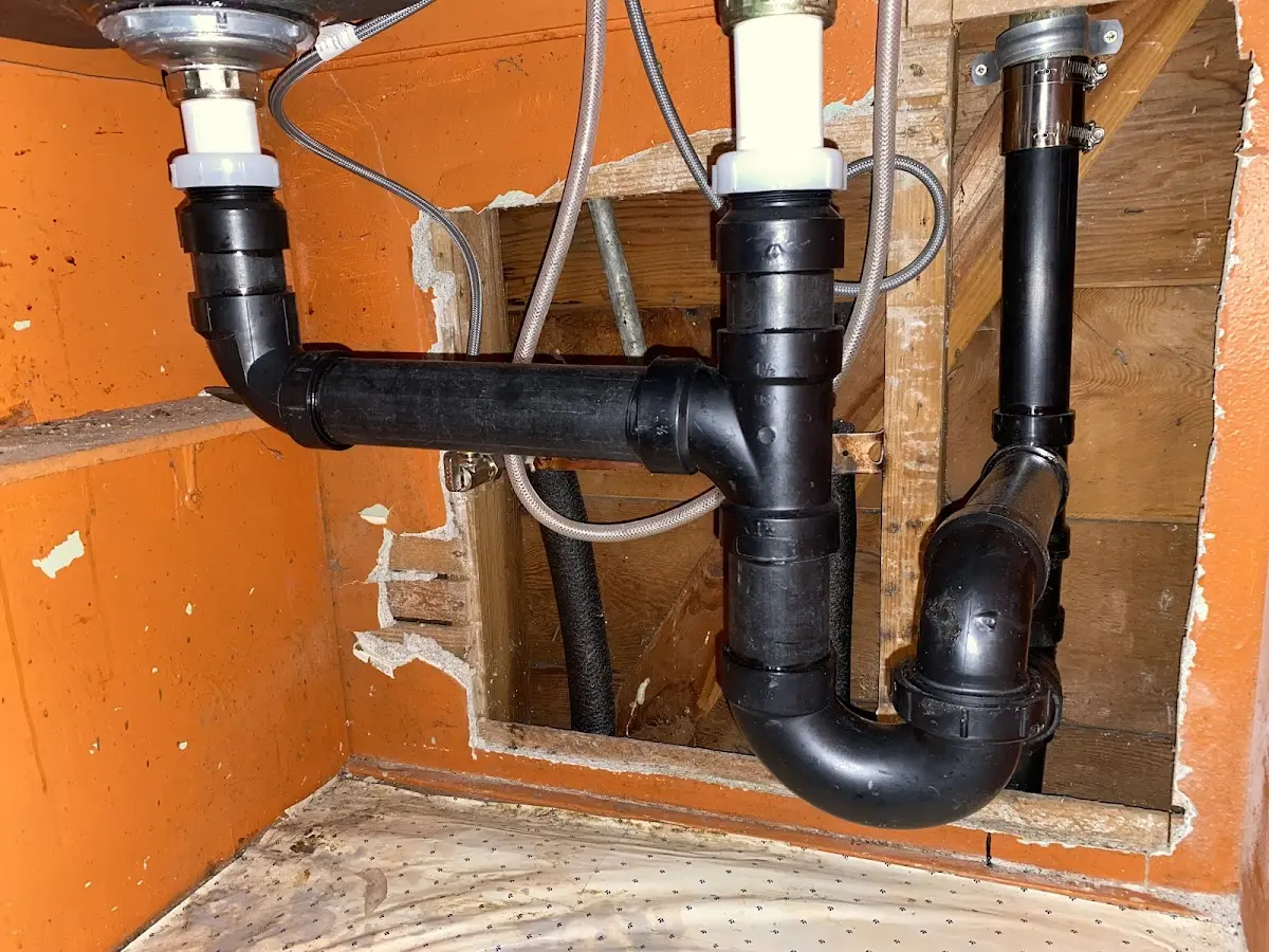 Professional Garbage Disposal Repair equipment and tools on the job in Walker Mill